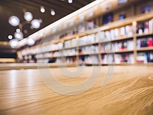 Table top Counter with Blur Bookshelf Bookstore Background