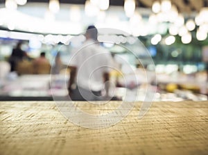 Table top Counter with Blurred People Shop interior backgroud