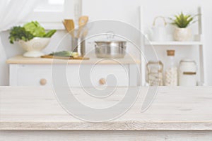 Table top and defocused kitchen interior as background