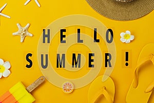 Table top view accessory of clothing women  plan to travel in Hello text summer holiday background concept.Ice cream with many