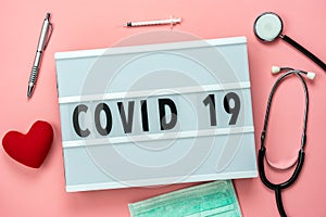 Table top view aerial image of accessories healthcare & medical with coronavirus or COVID-19 text background concept.Flat lay of