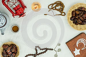 Table top view aerial image of decoration Ramadan Kareem holiday background.Flat lay essential objects halal meal set for fasting