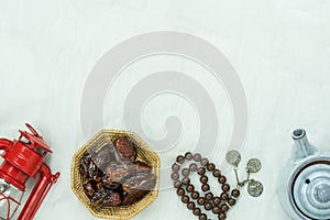 Table top view aerial image of decorations Ramadan Kareem holiday background.