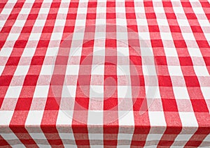 Table top view covered by red gingham tablecloth