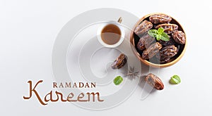 Table top view image of decoration Ramadan Kareem background, dates fruit and coffee. Flat lay background with copy space