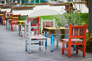 Table of Turkish cafe with low table and small chairs in Uskudar district on Asian side of Istanbul, Turkey
