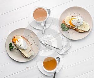 Table for two, poached egg and tea, topshot