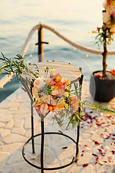 Table for the wedding ceremony, flower arrangement. Wedding deco