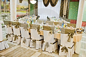 Table of wedding reception and chairs.