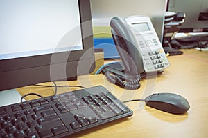 Table work in office with telephone and computer