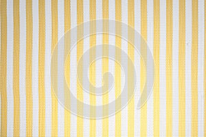Tablecloth fabric with yellow and white lines degraded light bulb. Home fabric