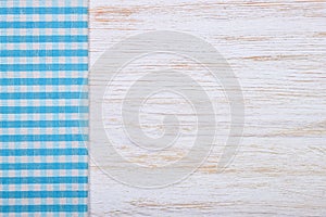 Tablecloth textile texture on wooden background