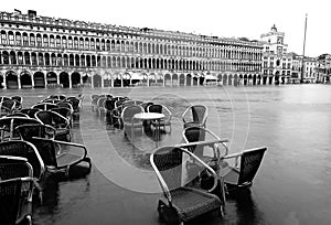 Tables and Chairs of an alfresco cafe in Saint Mark Square in Ve