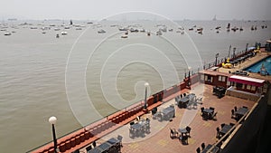 Open air Dining setup at sea front cafe photo