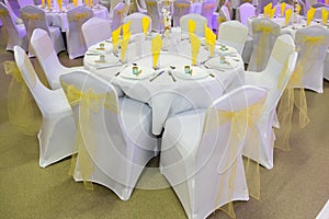 Tables Chairs as part of a banqueting set up photo