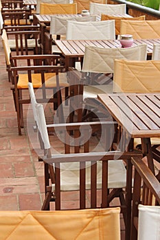 Tables and chairs in a beach restaurant