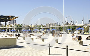 Tables and chairs on the esplanade of the Museu del Disseny in Barcelona