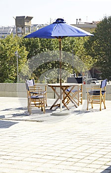 Tables and chairs on the esplanade of the Museu del Disseny in Barcelona