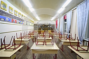 Tables and chairs inside school class
