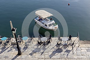 Tables and chairs of a street cafe Greece, Peloponnese