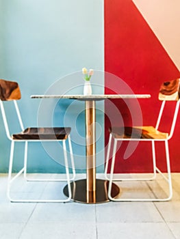 Tables and chairs to sit at work or relax and have a beautiful colorful background. ,abstract blur background