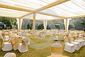 Tables and chairs on a wedding reception