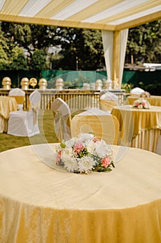 Tables and chairs on a wedding reception