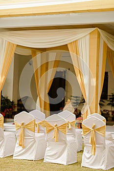 Tables and chairs on a wedding reception