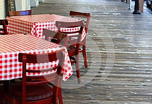 Tables with a red checkered tablecloth