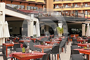 Tables set for meal in modern restaurant