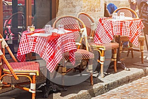 Tables of traditional outdoor French cafe in Paris