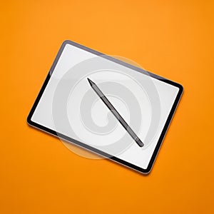 Diagonally, highlighting its slender design. The vibrant orange surface underne