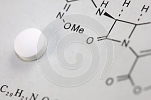 Tablet and chemical formula