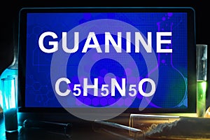 Tablet with chemical formula of guanine.