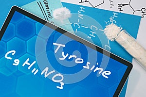 Tablet with the chemical formula of Tyrosine .