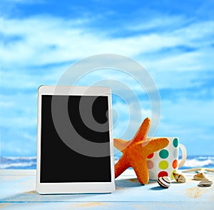 Tablet computer on the beach