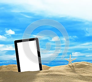 Tablet computer on the beach