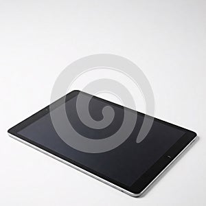 Tablet computer with black screen on white background. Isolated front view