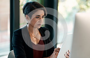Tablet, computer and business woman in office for website analysis, online management or technology solution. Review