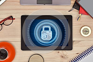 Tablet computer and digital lock icon hologram with circle binary numders