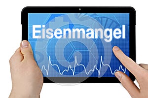 Tablet computer with the german word for iron deficiency - Eisenmangel