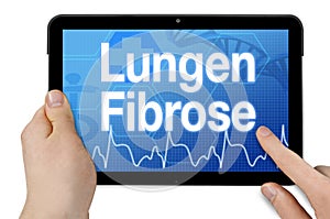 Tablet computer with the german word for lung fibrosis - Lungenfibrose