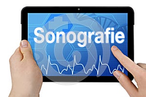 Tablet computer with the german word for sonography - Sonografie photo