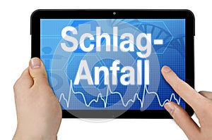 Tablet computer with the german word for stroke - Schlaganfall photo