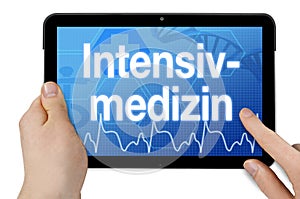 Tablet computer with touchscreen and the german word for intensive care - Intensivmedizin