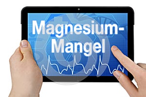 Tablet comTablet computer with the german word for magnesium deficiency puter with the german word for addiction care - Suchthilfe