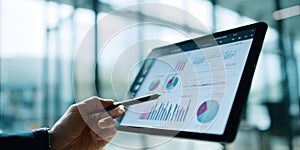 The tablet displaying detailed analytics in a modern business environment. AI generated image