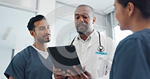 Tablet, doctor and nurses conversation, communication and online research in hospital. Black man, medical professional