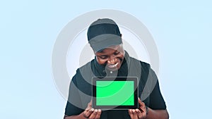 Tablet, green screen and black man with advertising for delivery, courier app and ads on blue background. Tracking
