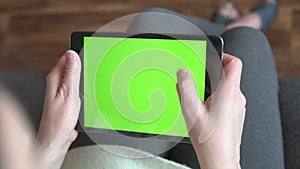 Tablet with Green Screen and Chroma Key Closeup. Chromakey Mockup with Alpha Matte.